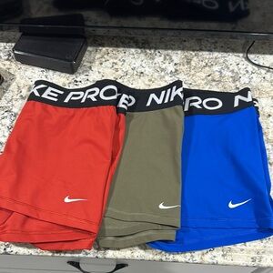Nike Athletic Shorts - Red, Olive, and Blue